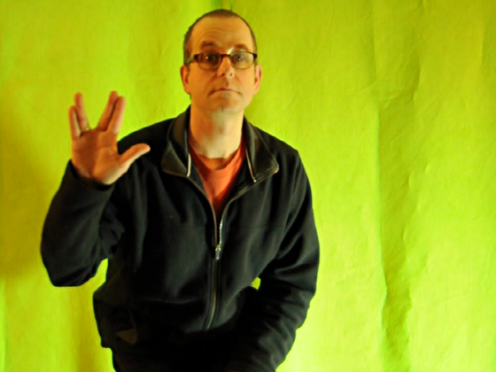 Actor in front of a green screen